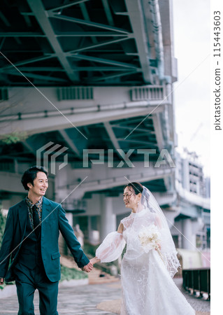 Couple taking location photo wedding photos 115443603