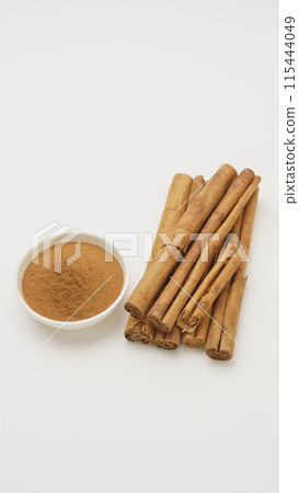 Cinnamon | Cinnamon sticks and cinnamon powder 115444049