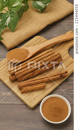 Cinnamon | Cinnamon sticks and cinnamon powder 115444058