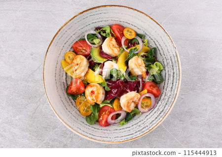 Shrimp, Avocado, Tomato Salad. Grilled View from above, top studio shot 115444913