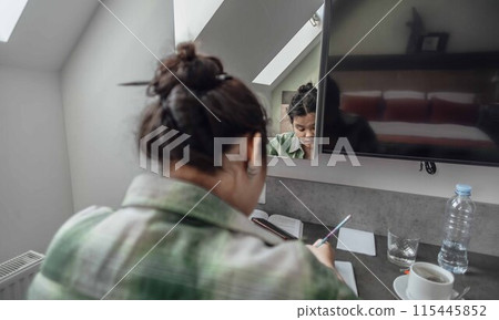 plus-size freelancer working intently on her project, reflecting the balance of productivity and comfort in a home setting plus-size freelancer working intently on her project, reflecting the balance of productivity and comfort in a home setting 115445852