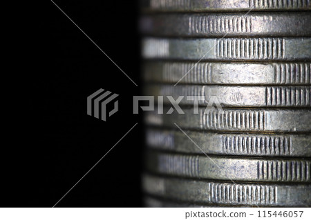 Stack of silver coins in close-up, texture of old coins Stack of silver coins in close-up, texture of old coins 115446057