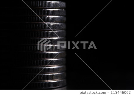 Stack of silver coins in close-up, texture of old coins Stack of silver coins in close-up, texture of old coins 115446062