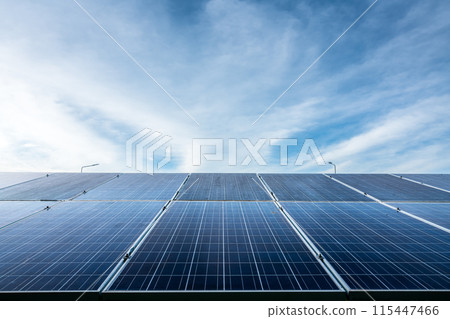 Photovoltaic solar power panel on dramatic sunset blue sky background, green clean Alternative power energy concept. Photovoltaic solar power panel on dramatic sunset blue sky background, green clean Alternative power energy concept. 115447466