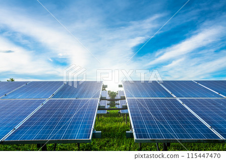 Photovoltaic solar power panel on dramatic sunset blue sky background, green clean Alternative power energy concept. 115447470