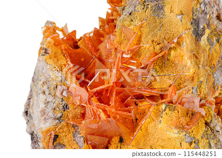 Macro stone mineral Wulfenite on a white background Macro stone mineral Wulfenite on a white background 115448251
