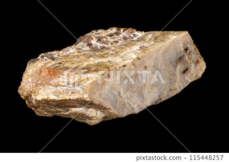 Macro of a stone Moonstone mineral on a black background Macro of a stone Moonstone mineral on a black background 115448257