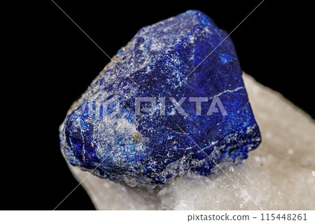 Macro of mineral stone Lazurite on a black background 115448261