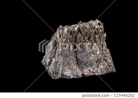 Macro of a stone Stibnite mineral on a black background Macro of a stone Stibnite mineral on a black background 115448282