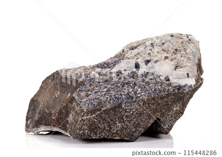 Macro stone Aegirine in charoite on white background Macro stone Aegirine in charoite on white background 115448286
