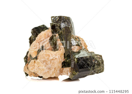 Macro of a mineral stone Vesuvianite on a white background Macro of a mineral stone Vesuvianite on a white background 115448295