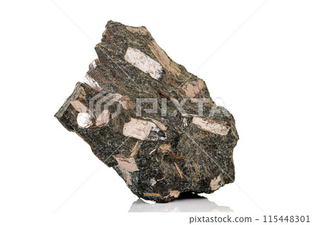 Macro stone mineral Diopside Calcite Magnetite on a white background 115448301