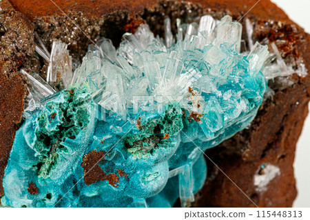 Macro stone Hemimorphite mineral on white background Macro stone Hemimorphite mineral on white background 115448313