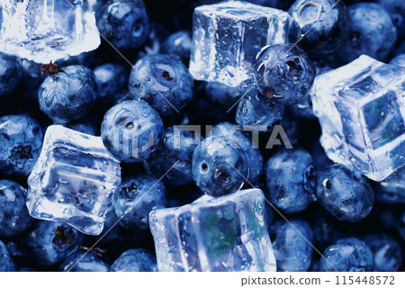 Blueberry berry background. Macro. Fresh blueberry background. Water drops and ice cubes on ripe blueberries 115448572