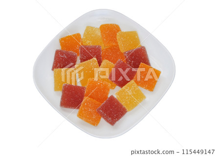 Marmalade in a plate isolated on white background. Sweet colorful dessert in plate for the holiday. Top view. Marmalade in a plate isolated on white background. Sweet colorful dessert in plate for the holiday. Top view. 115449147