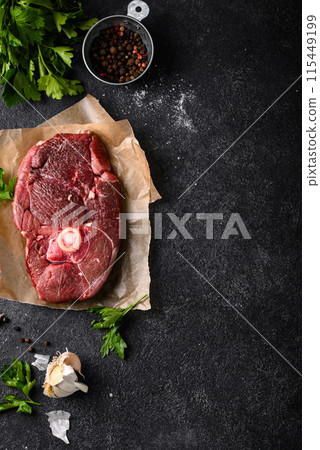 Raw uncooked lamb steak with spices 115449199