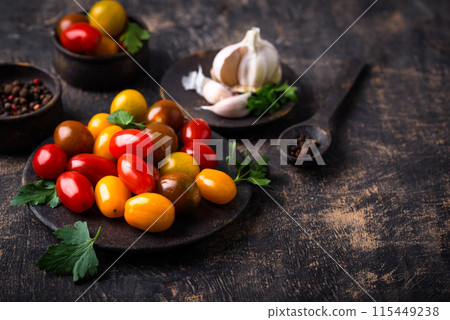 Assortment of different cherry tomatoes 115449238