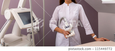 Cosmetologist applying sheet mask on woman's face in beauty salon. 115449772