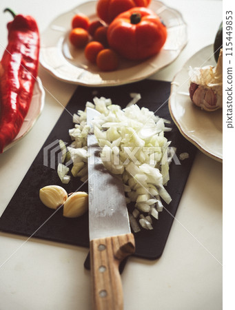 Vegetable ingredients in the kitchen Vegetable ingredients in the kitchen 115449853