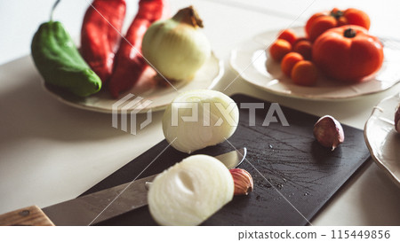 Vegetable ingredients in the kitchen Vegetable ingredients in the kitchen 115449856