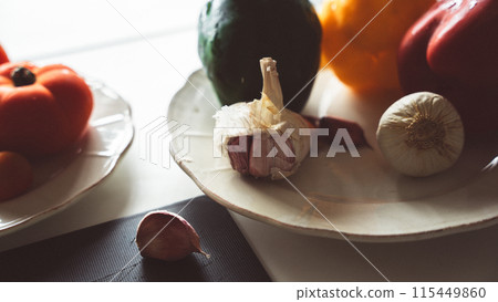 Vegetable ingredients in the kitchen Vegetable ingredients in the kitchen 115449860