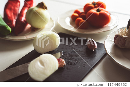 Vegetable ingredients in the kitchen Vegetable ingredients in the kitchen 115449862