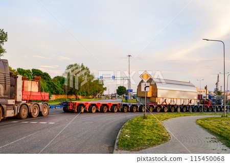 Transportation of oversize very heavy cargo on a very long multi-axle truck trailer 115450068