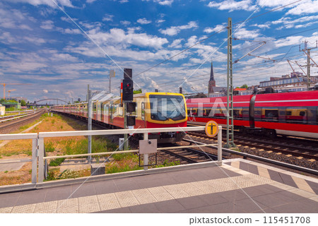 Yellow carriages of the famous Berlin metro on a sunny day. 115451708
