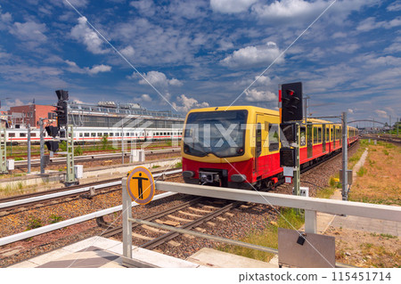 Yellow carriages of the famous Berlin metro on a sunny day. 115451714