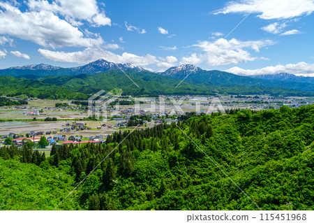 Echigo Sanzan and townscape Echigo Sanzan and townscape 115451968