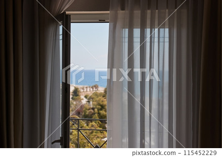 Apartment with sea view, open balcony door Apartment with sea view, open balcony door 115452229