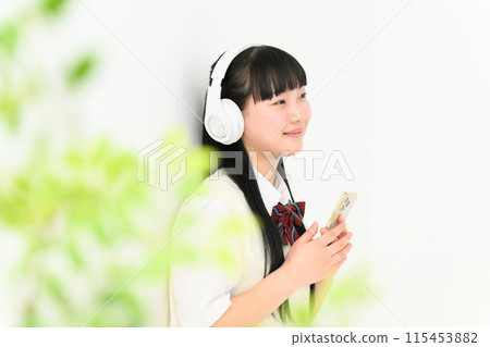 High school girl listening to music, headphones 115453882