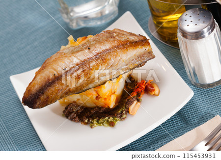 Roasted scomber with potatoes Roasted scomber with potatoes 115453931