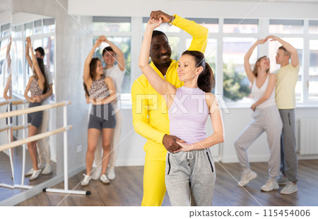 Couple adult woman and man dancing waltz 115454006