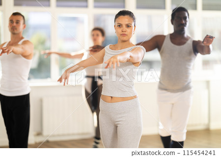 Group of dancers rehearsing ballet dance Group of dancers rehearsing ballet dance 115454241