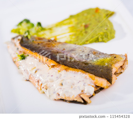Roasted trout fillet with broccoli Roasted trout fillet with broccoli 115454328