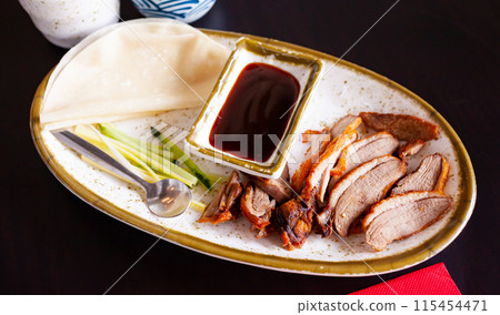 Peking duck with sauce and chinese pancakes 115454471