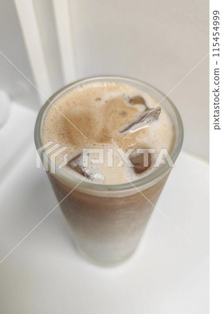 Cup of iced coffee top view 115454999