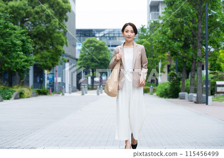Young woman in casual suit Business image Young woman in casual suit Business image 115456499