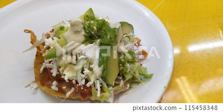 1 authentic Mexican chicken tostada 1 authentic Mexican chicken tostada 115458348