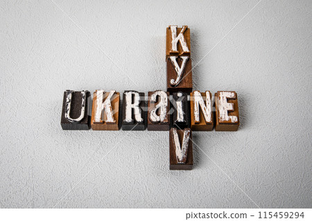 UKRAINE KYIV. Alphabet blocks, crossword puzzle on gray textured background UKRAINE KYIV. Alphabet blocks, crossword puzzle on gray textured background 115459294