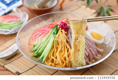 Summer dish: chilled Chinese noodles served on a cool transparent plate 115459356