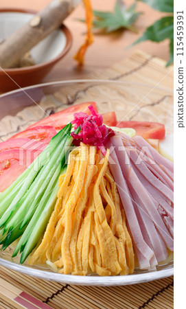 Summer dish: chilled Chinese noodles served on a cool transparent plate Summer dish: chilled Chinese noodles served on a cool transparent plate 115459391