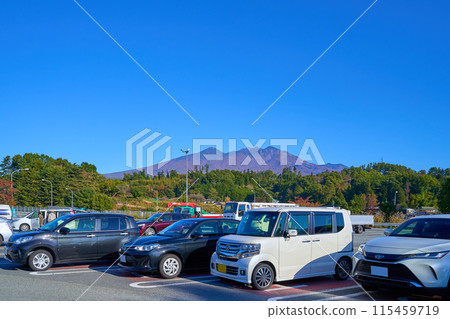 View of the Yatsugatake mountain range to the north over a parked car from Yatsugatake PA (outbound) in Hokuto City, Yamanashi Prefecture View of the Yatsugatake mountain range to the north over a parked car from Yatsugatake PA (outbound) in Hokuto City, Yamanashi Prefecture 115459719