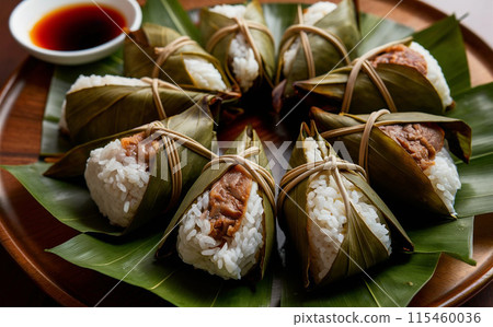 Savory Rice Dumplings on Bamboo Leaf with Soy Sauce - Generated by AI 115460036