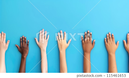 Colorful cut out paper hands of different skin colors reaching up on a blue background. 115461653