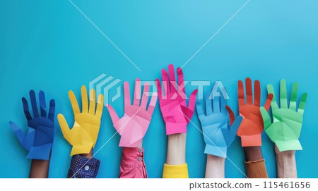 Colorful cut out paper hands of different skin colors reaching up on a blue background. Colorful cut out paper hands of different skin colors reaching up on a blue background. 115461656