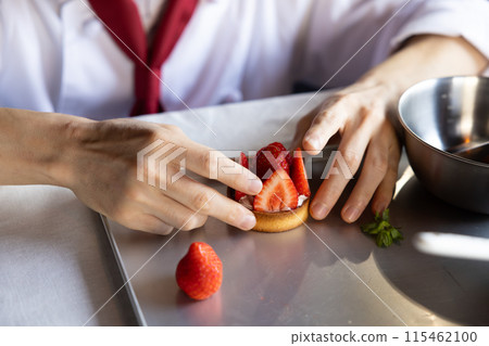 Making sweets at the pastry chef's hand (without face) 115462100