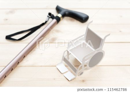 Wheelchair and cane 115462786