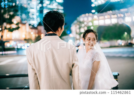 A couple enjoying a photo wedding at Tokyo Station at night A couple enjoying a photo wedding at Tokyo Station at night 115462861